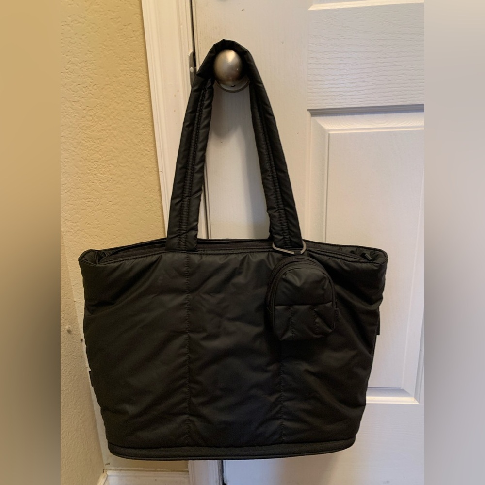 Calpax laptop tote with mini backpack.